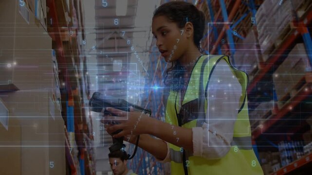 Warehouse associate activating scanner, scanning box labels and reaching shelves for stock update