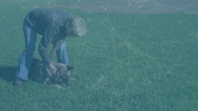 Senior woman noticing dog lying, bending and steadying for pet care while heart icon appearing