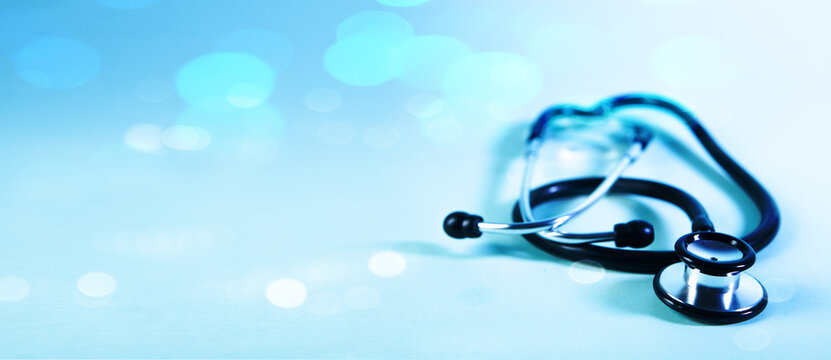 medical stethoscope on a blue background.
