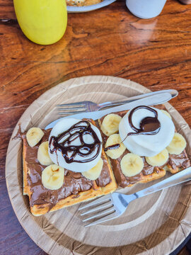 The famous Char Dukan Banana Nutella Ice cream waffle in Landour, India. The famous "Char Dukan" (four shops since 1910) of Landour. The place is famous for its Colonial History. 