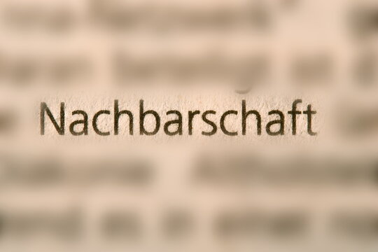 Der Begriff " Nachbarschaft " in der Zeitung gedruckt und durch Umgebungsunsch&auml;rfe betont