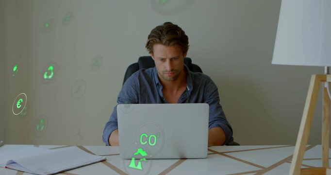 Man working laptop, incoming green icons drifting from left showing energy data circling CO symbols