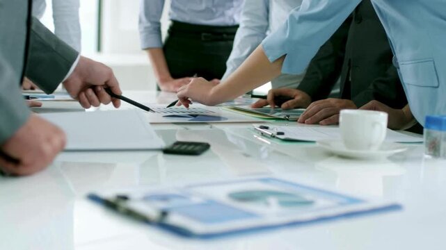 Business team meeting, office collaboration, corporate strategy, planning documents