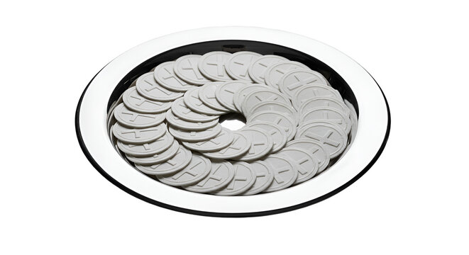 Communion wafers arranged in a circle on a silver paten emphasizing religious sacrament offering and spiritual nourishment on a clean isolated background