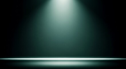 Naklejka premium A dark empty stage illuminated by a single bright overhead spotlight beam