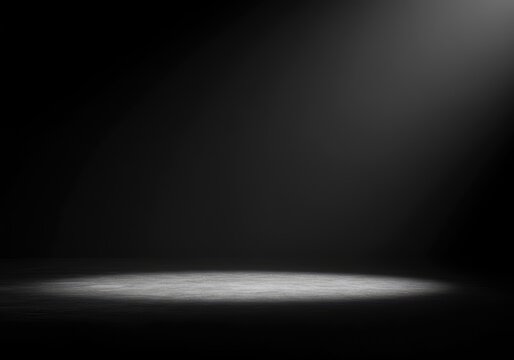 Mysterious glowing light source creating subtle diffusion and deep shadows in a dark conceptual space, spirit, energy, metaphor