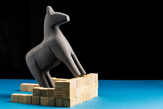 Wooden Toy Horse Paused Before Fence, Path Blocked Symbolism