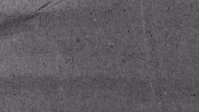 White gray wrinkled paper texture background with crumpled surface and soft lighting