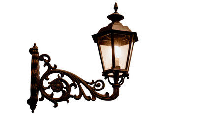 Isolated ornate vintage wall lantern, glowing light bulb, elegant decorative metalwork design. © Maria