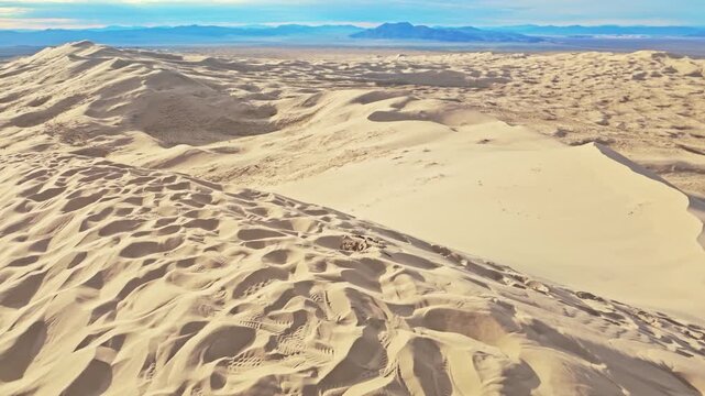 Kelso Dunes panoramic view at sunset Mojave Desert