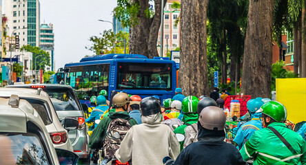 A view of motor traffic on a typical street in Ho Chi Minh City. Vietnam on bright spring day © Nicola