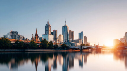 Naklejka premium Melbourne city skyline at sunset reflecting on Yarra River, showing modern buildings and urban architecture