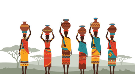 Fototapeta premium African women in colorful traditional dress carry water pots across the savanna