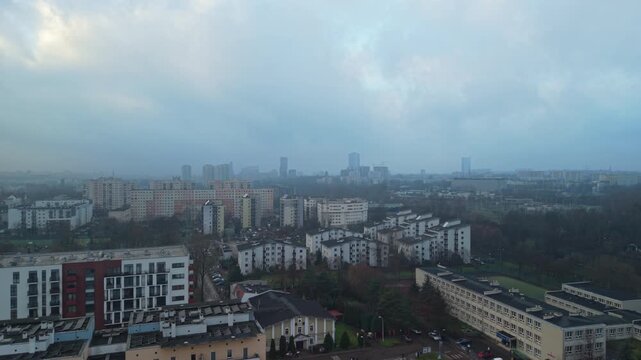 Aerial view of Katowice city skyscrapers panorama in hazy winter smog, Poland