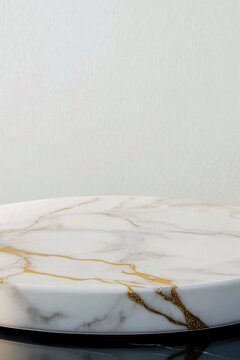 A slice of marble cake sits atop a wooden table, perfect for display or serving. vertical frame