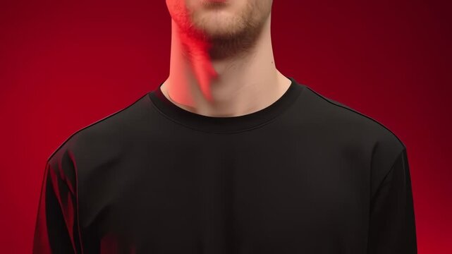 Black T-shirt Mockup on Male Model over Red Background