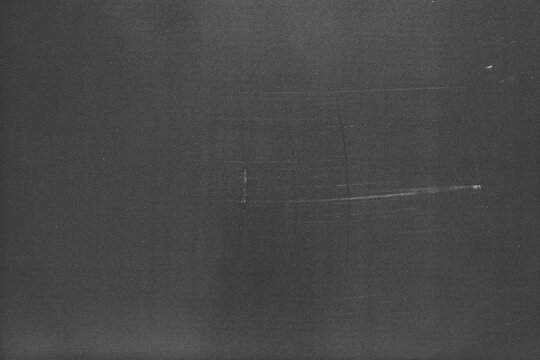 grunge scratch and dust on black background,retro noisy grain dust texture for film or photo overlay,old photo overlay texture,black grainy background with dust and scratch,worn paper background