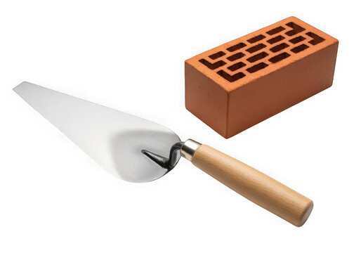 A trowel and a red brick isolated on transparent background