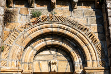 Romanesque Tympanum and Checkerboard Archivolts of the Church of Santa Maria de Gomariz, 12th-13th Century, Spain © Nandi Estévez