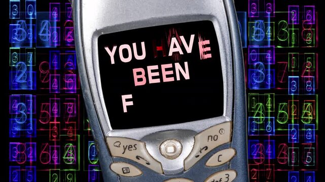retro and old mobile telephone with you have been hacked