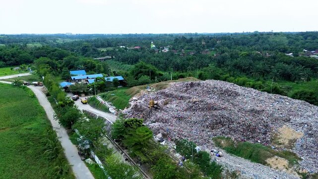 Aerial view of landfill site filled with garbage showing environmental pollution and waste problem