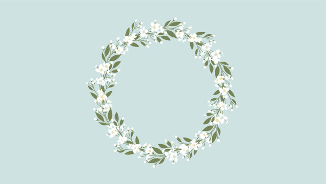 Beautiful circular wreath made of small white jasmine flowers and green leaves on a soft blue background.