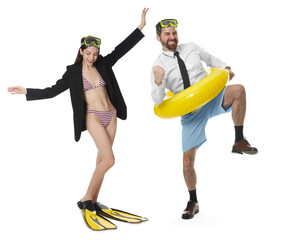 Office workers dreaming about vacation. Man and woman with diving masks, swim flippers and inflatable ring on white background © New Africa