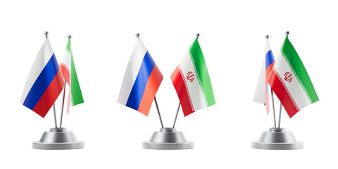 Desk flags on metal stands shown in realistic style on white background presenting concept of unity and diplomacy, including 3D Rendering © ImageFlow