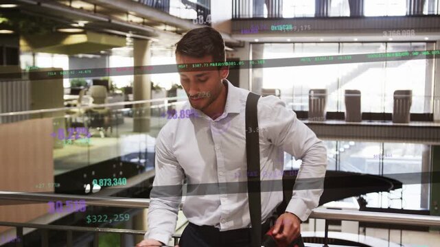 Man scrolling phone in atrium, checking stocks, stock overlays floating, raising to ear and calling