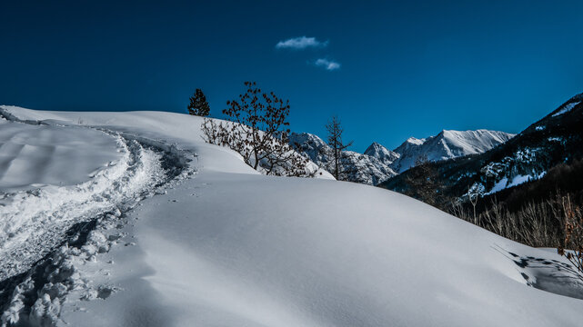 Snowshoeing in the Clar&eacute;e valley in winter - France
