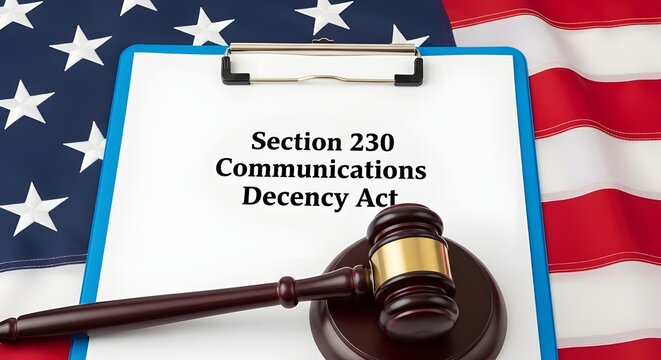 Clipboard with Section 230 Communications Decency Act document, gavel, and American flag representing legal and internet content moderation issues.