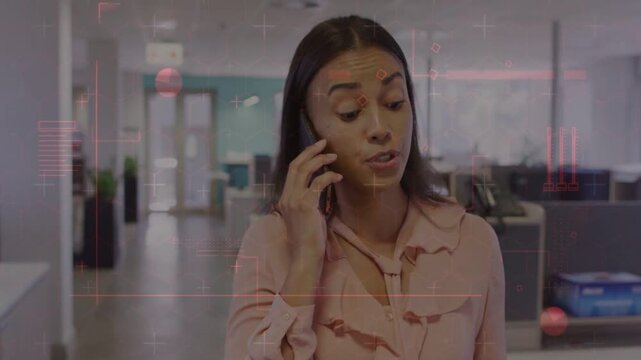 Office worker receiving phone call, checking docs and explaining issue, red HUD highlighting papers