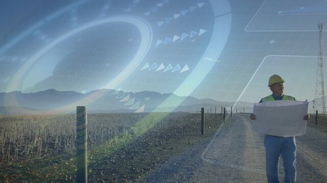 Energy inspector entering from right, checking plan while overlays aligning with turbine for survey