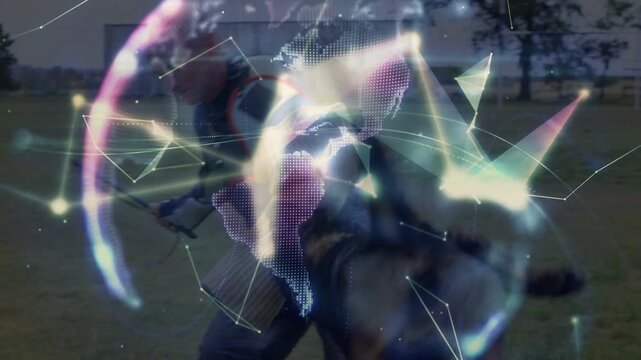 Handler sending K9 for training, trainer bracing bite sleeve restraining dog as holo globe growing