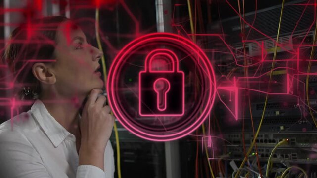 IT tech responding to red padlock alert, inspecting and replugging patch cables, securing network