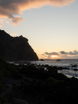 Walking on the coast in Buenavista del Norte at sunset