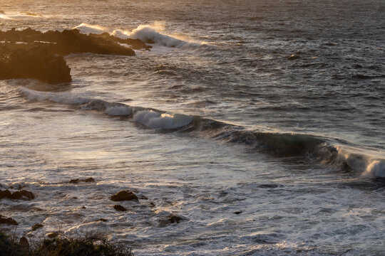 Walking on the coast in Buenavista del Norte at sunset