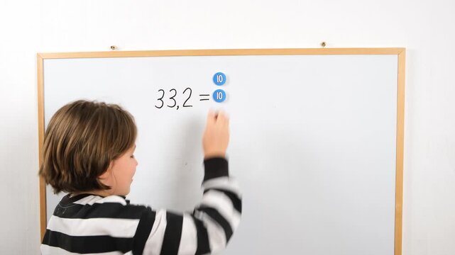 Child learning math concepts with visual aids on a whiteboard. Concept of online education, edtech platforms, digital courses, and modern learning methods for children.