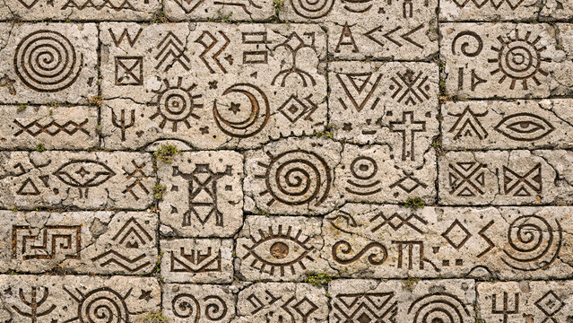 Ancient Stone Wall with Tribal Symbols Seamless Texture