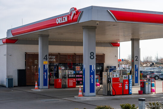 Modern Orlen gas station in Poland with fuel dispensers, Verva branding, Stop Cafe entrance and AdBlue tank, roadside infrastructure, professional refueling point for cars and trucks