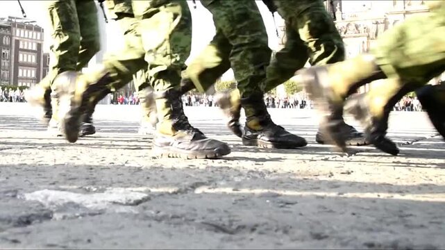 military, legs of soldiers with boots parading and marching in parade