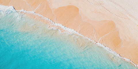 aerial view of turquoise coastline with golden sand and clear water transition © Nasrin