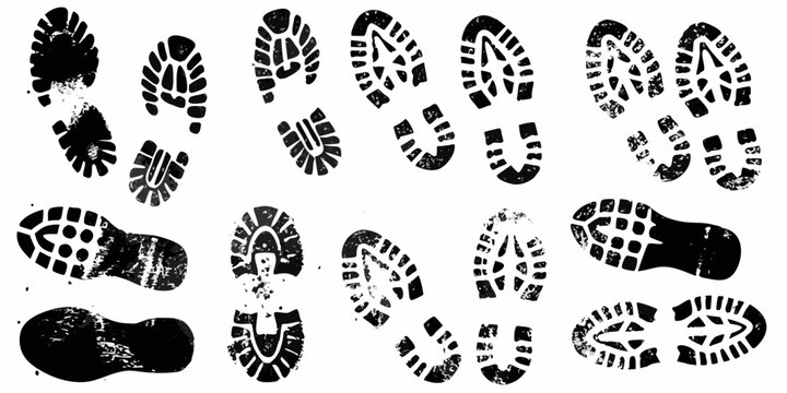Collection of black shoe prints and footprints on a white background