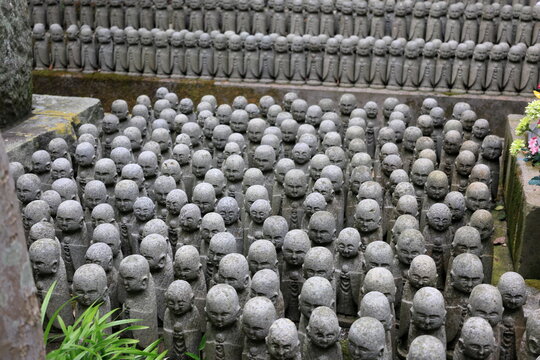 Rows of Jizo Statues at a Japanese Temple Representing Spiritual Guardians