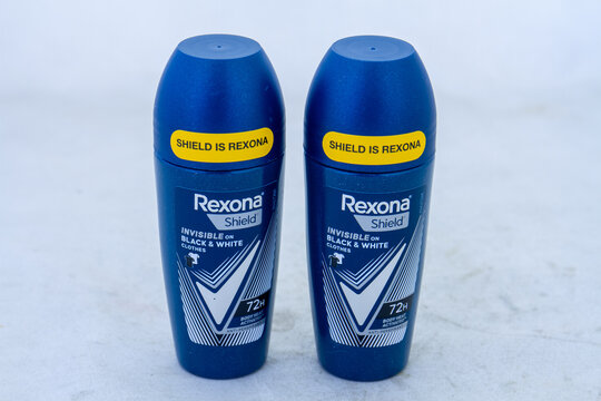 Johannesburg, South Africa - two Shield rexona anti-perspirant holders isolated on a clear background with copy space