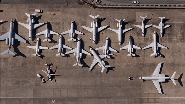 Aerial view of private jets at the airport. Drone footage of planes parked at the airport, Istanbul, Turkey.