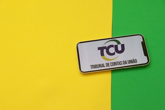 Salvador, Brazil - April 11, 2026: TCU (Tribunal de Contas da Uni&atilde;o) logo on a smartphone screen. Brazilian Federal Court of Accounts and public spending oversight. TCU logo. 