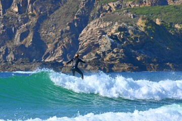 Surfer in powerful ocean waves near Ferrol, Spain March 12, 2026 © GenadiyGM