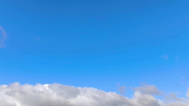 Strange grey cumulonimbus start to growing