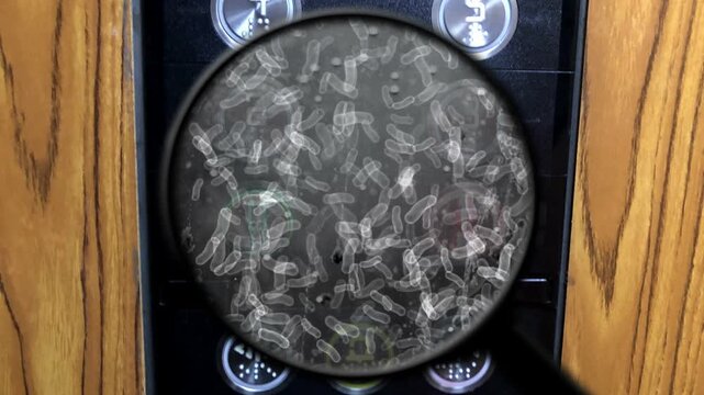 Magnified Germs on Elevator Buttons Highlighting Public Hygiene